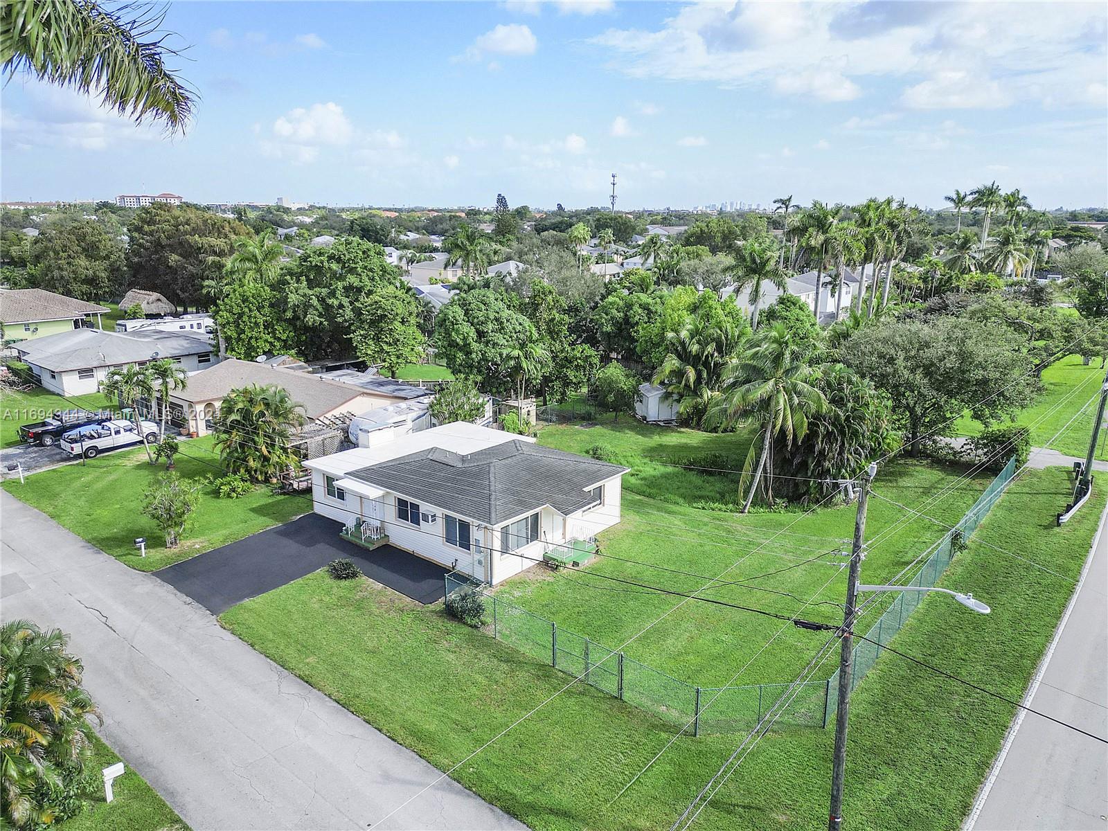 a view of a house with a big yard