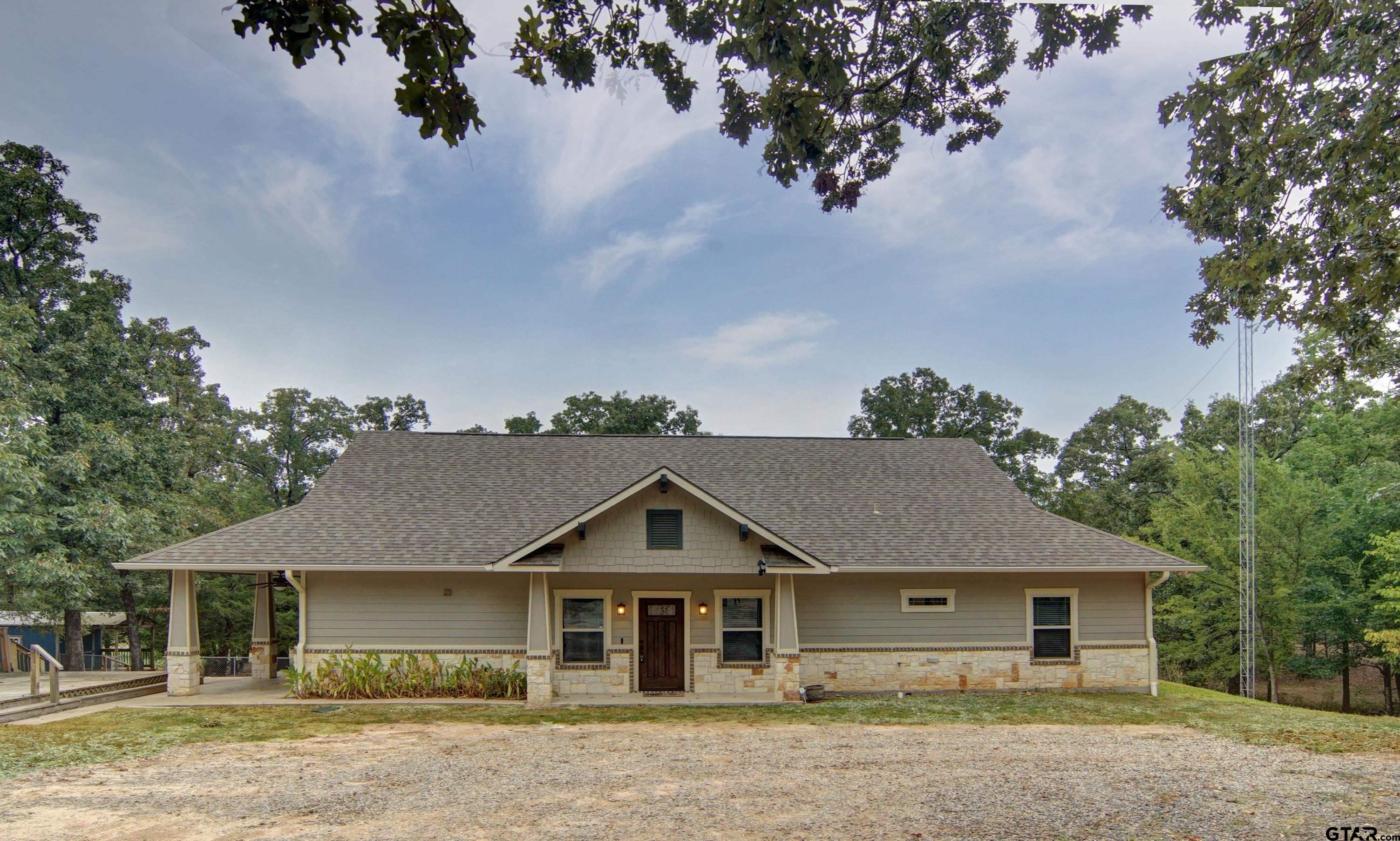 front view of a house with a dry yard