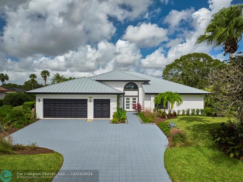 front view of a house with a big yard