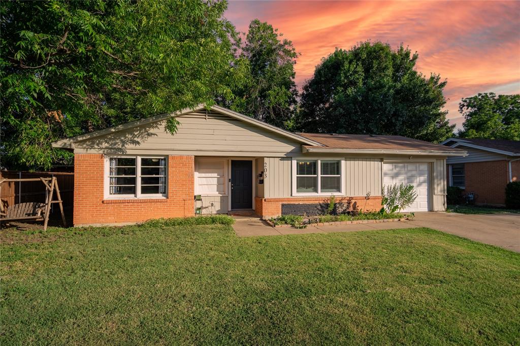 front view of a house with a patio