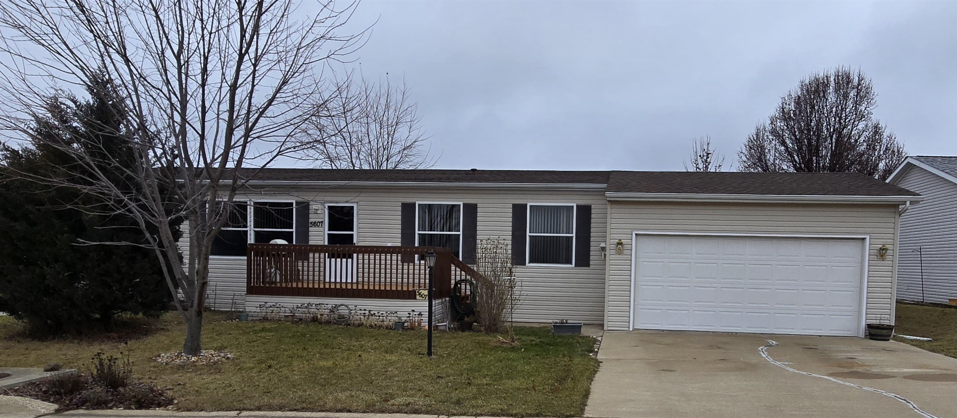 a view of house with outdoor space and porch