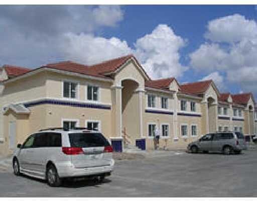 a car parked in front of a building