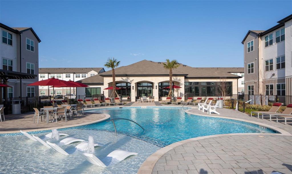 a view of a house with swimming pool