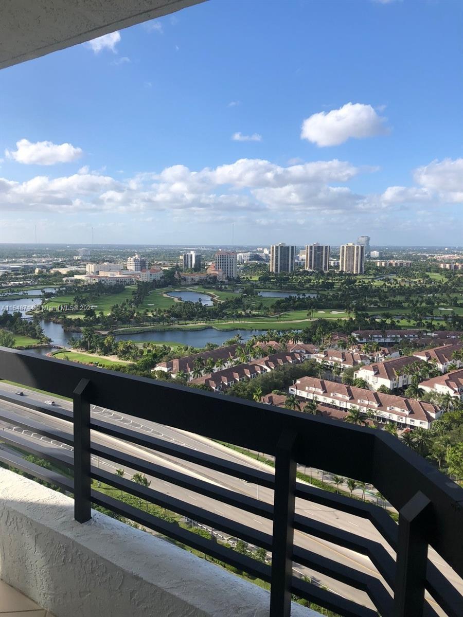 a view of city from a balcony