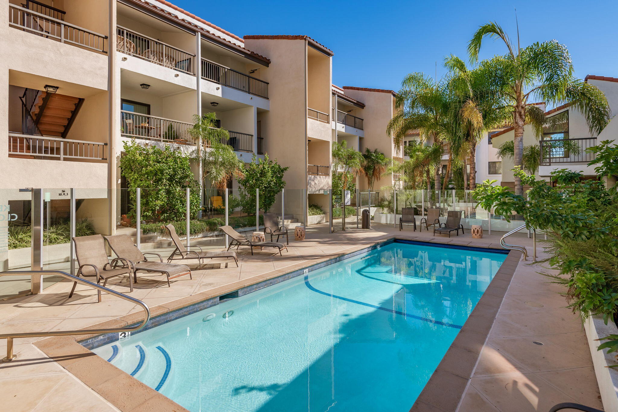 a view of a patio with swimming pool