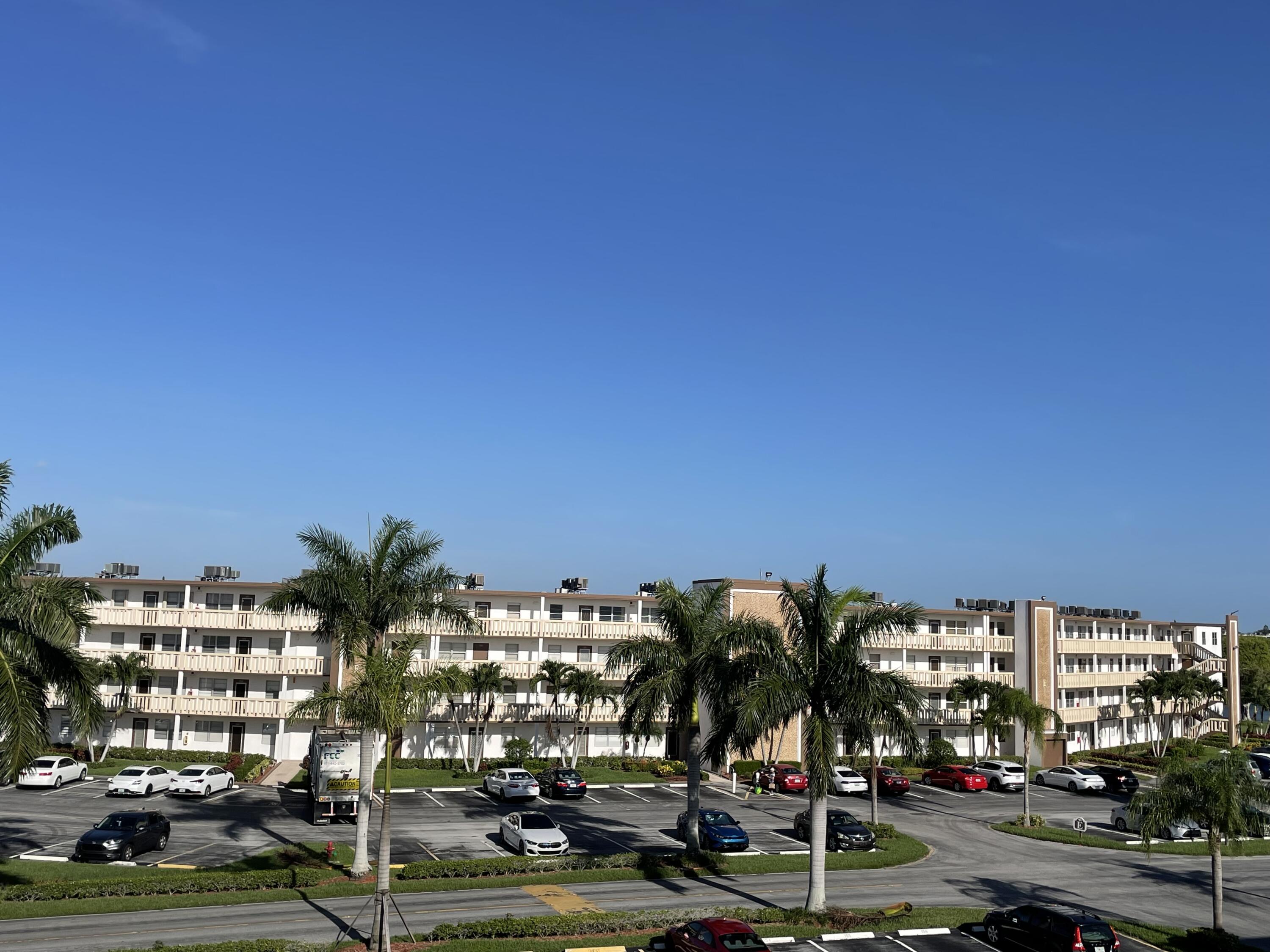 a view of a building with tree s