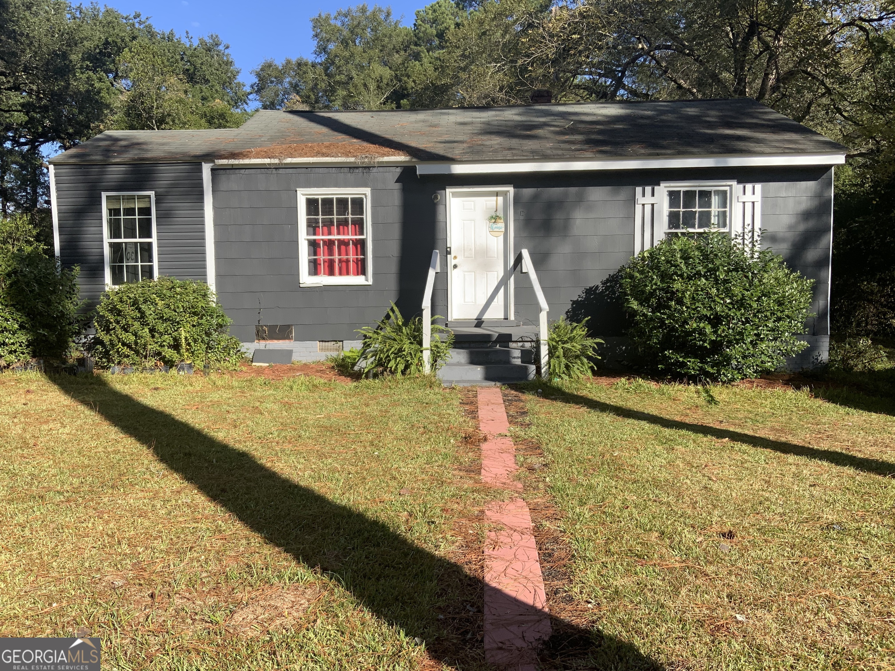 a front view of house with yard