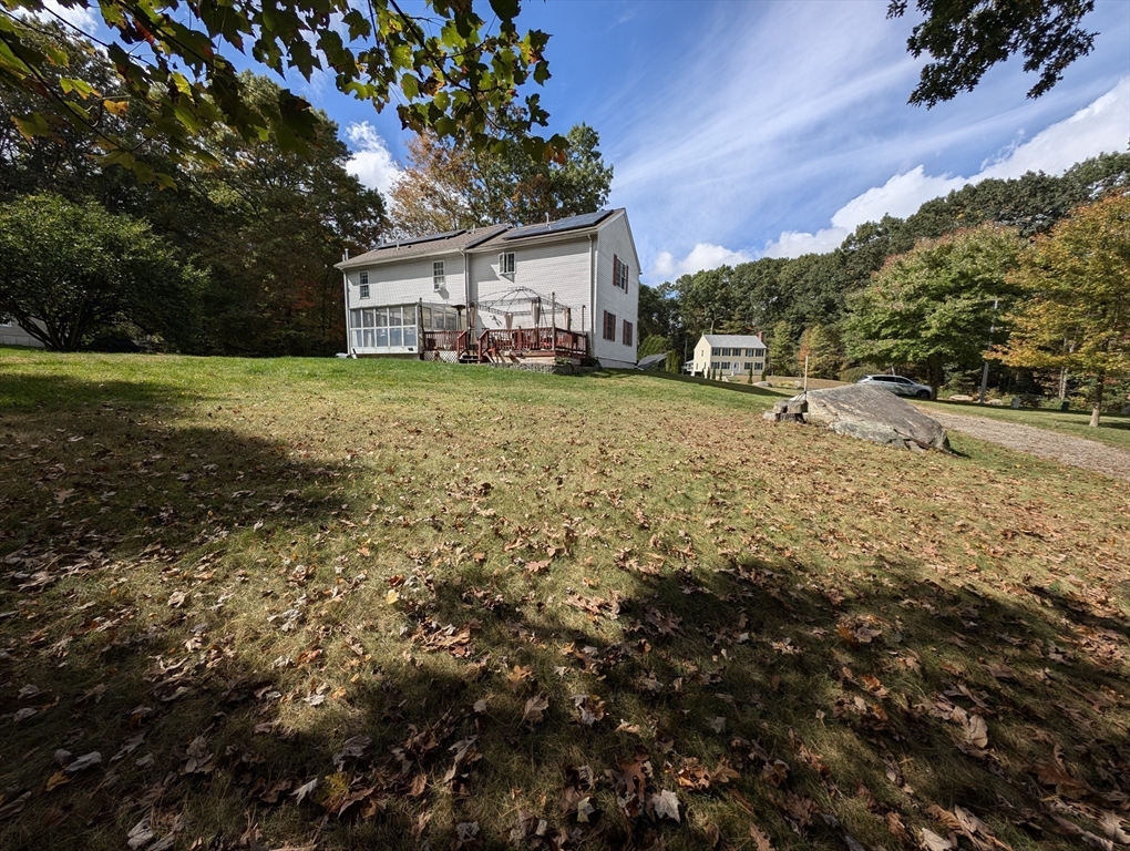 a house view with a garden space