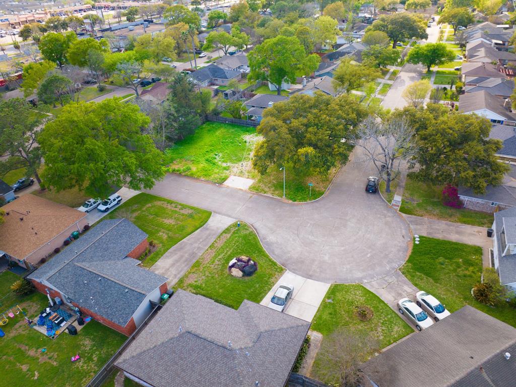 an aerial view of a house with a garden