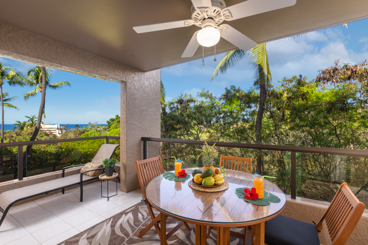 Soft breezes and easy living are waiting for you on this expansive corner unit lanai with ocean views.