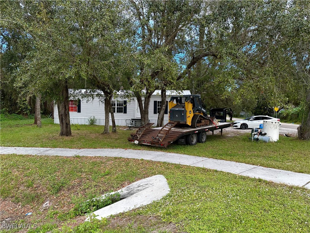 a view of a house with a park