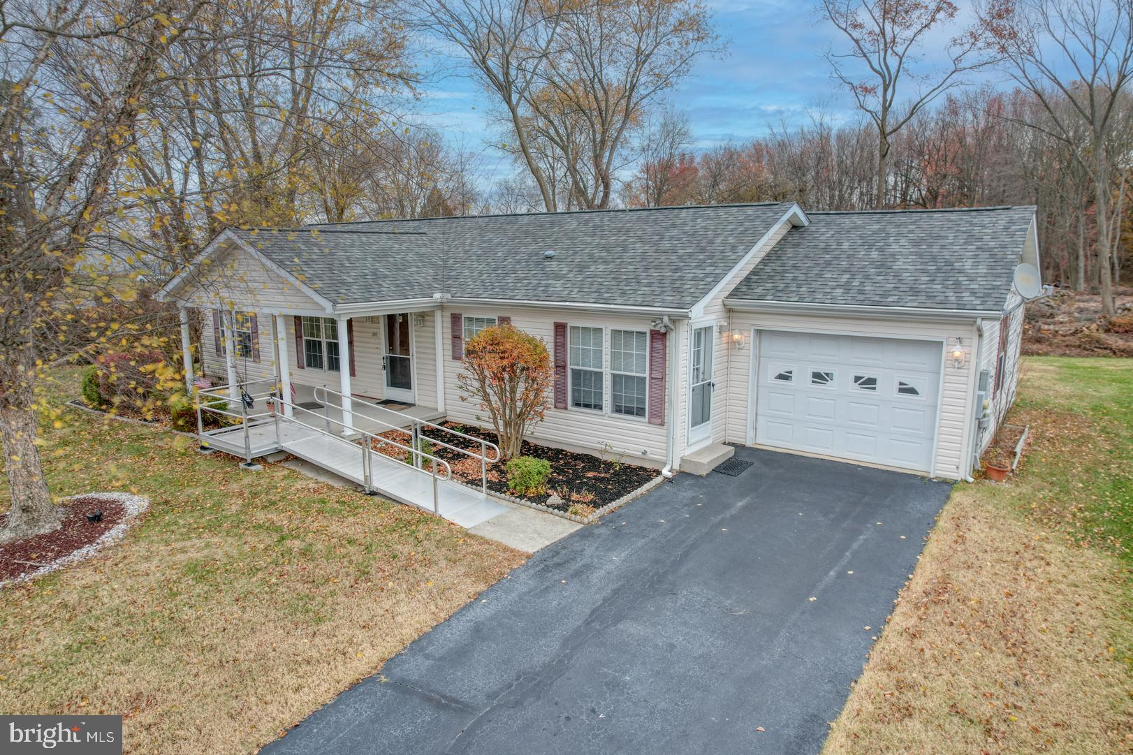 front view of a house with a yard