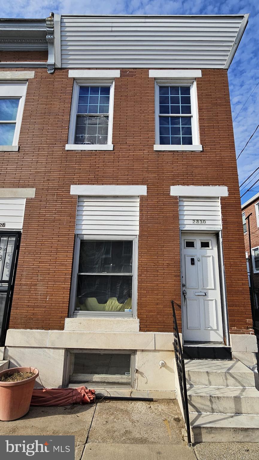 a front view of a house with a door