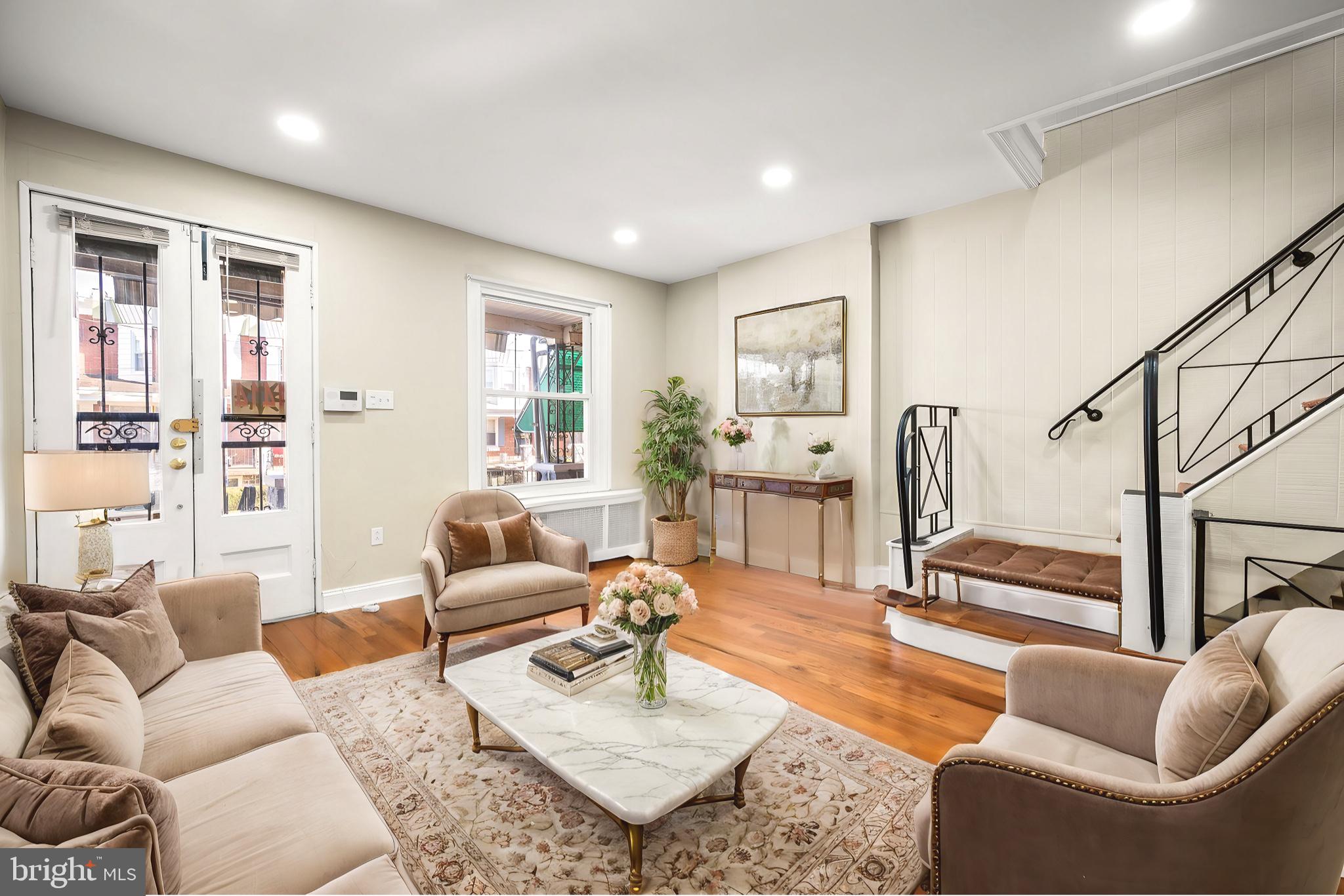 a living room with furniture and a table