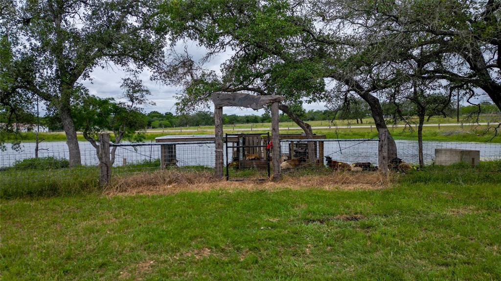 a view of backyard with green space