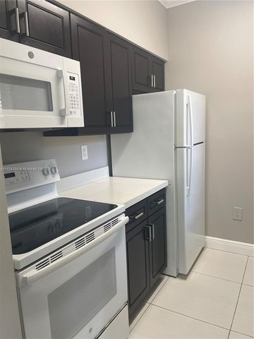 $1,850 | 1941 Northwest 96th Terrace, Unit 8E | Pembroke Lakes