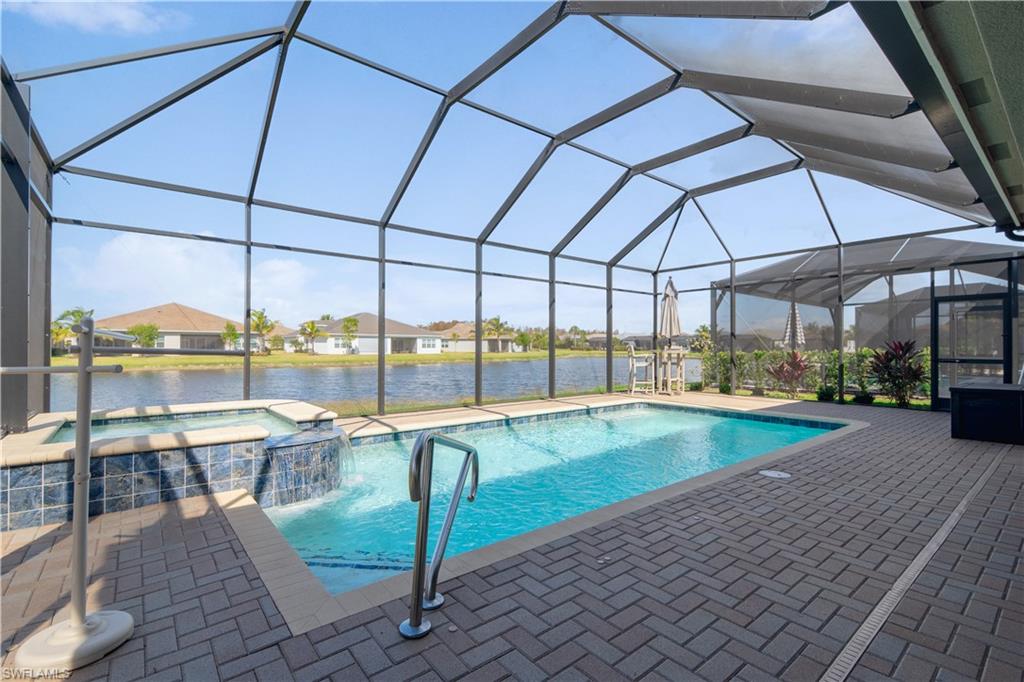 a view of a swimming pool with a porch