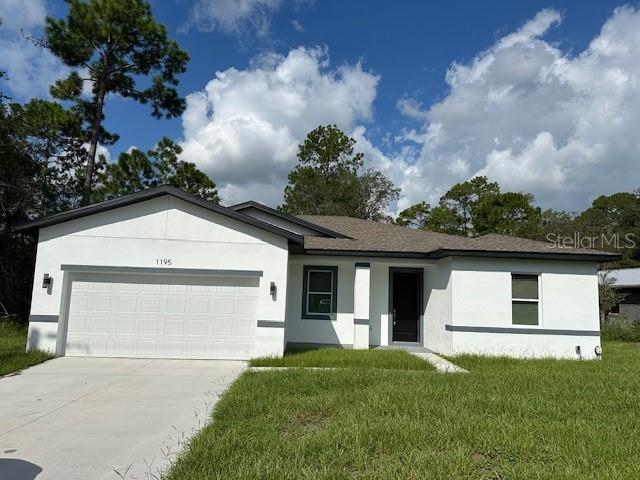 front view of a house with a yard