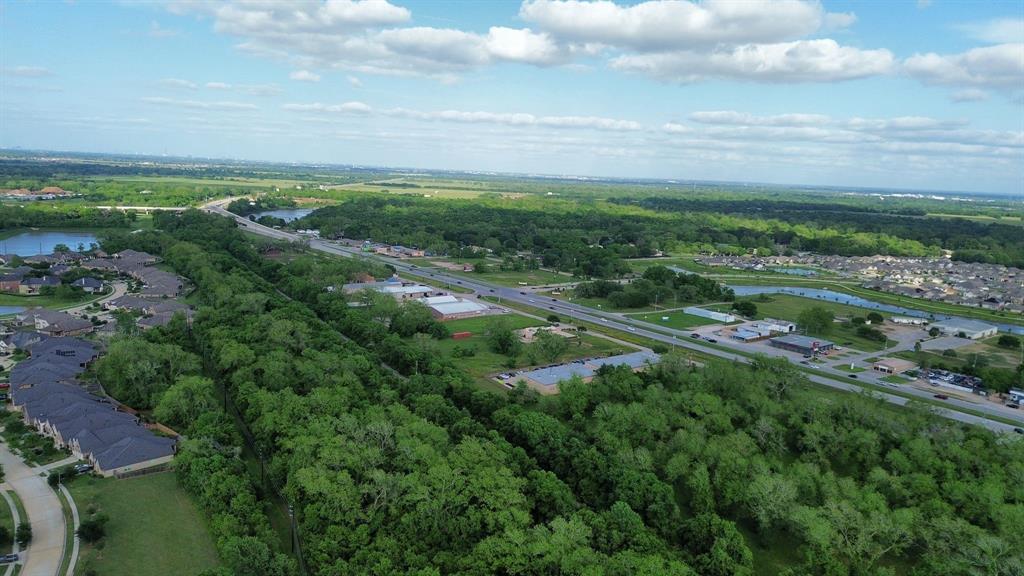 a view of a city with lots of trees