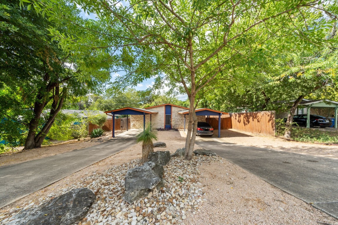 a house with trees in front of it