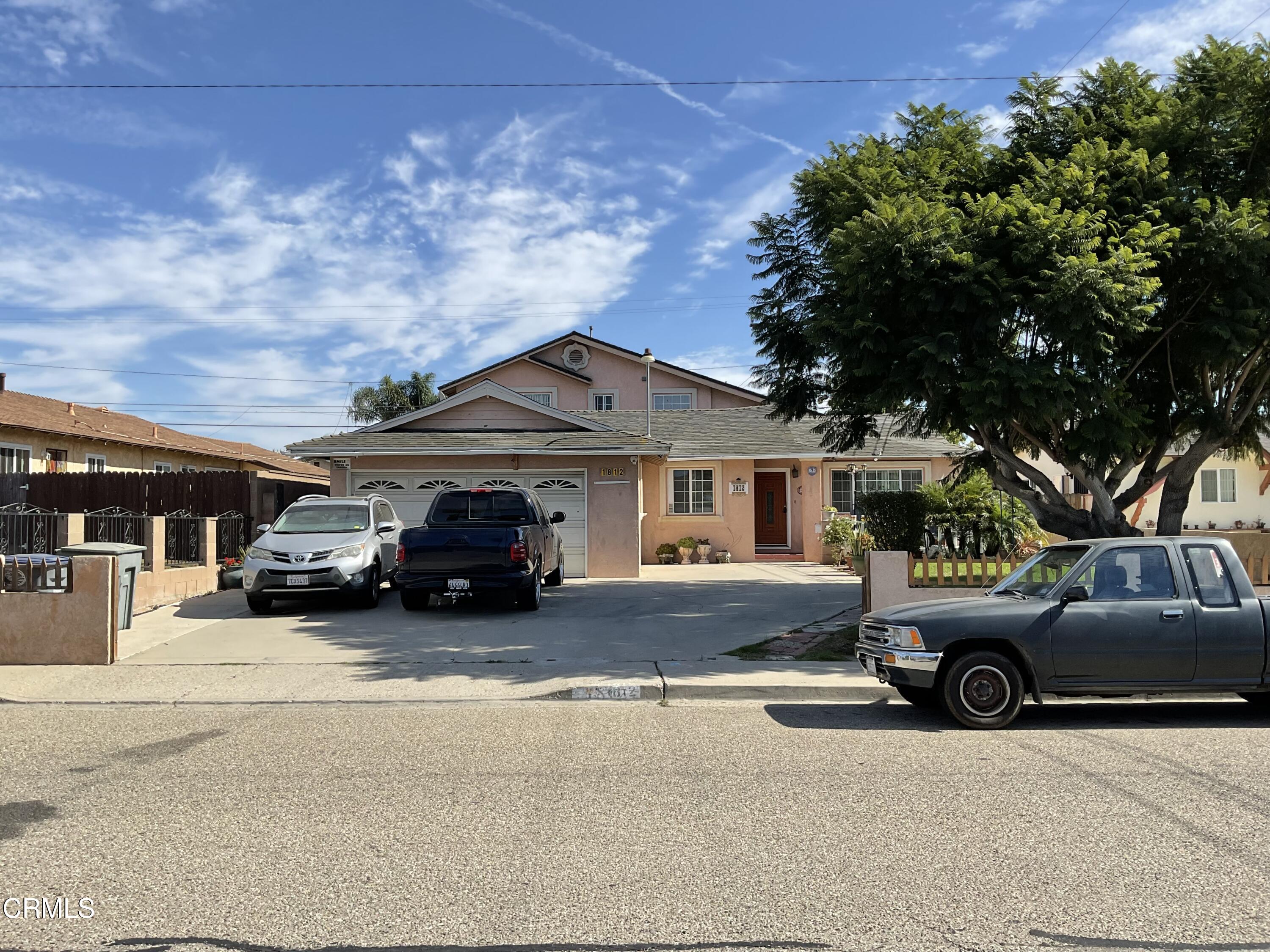 a car parked in front of a house