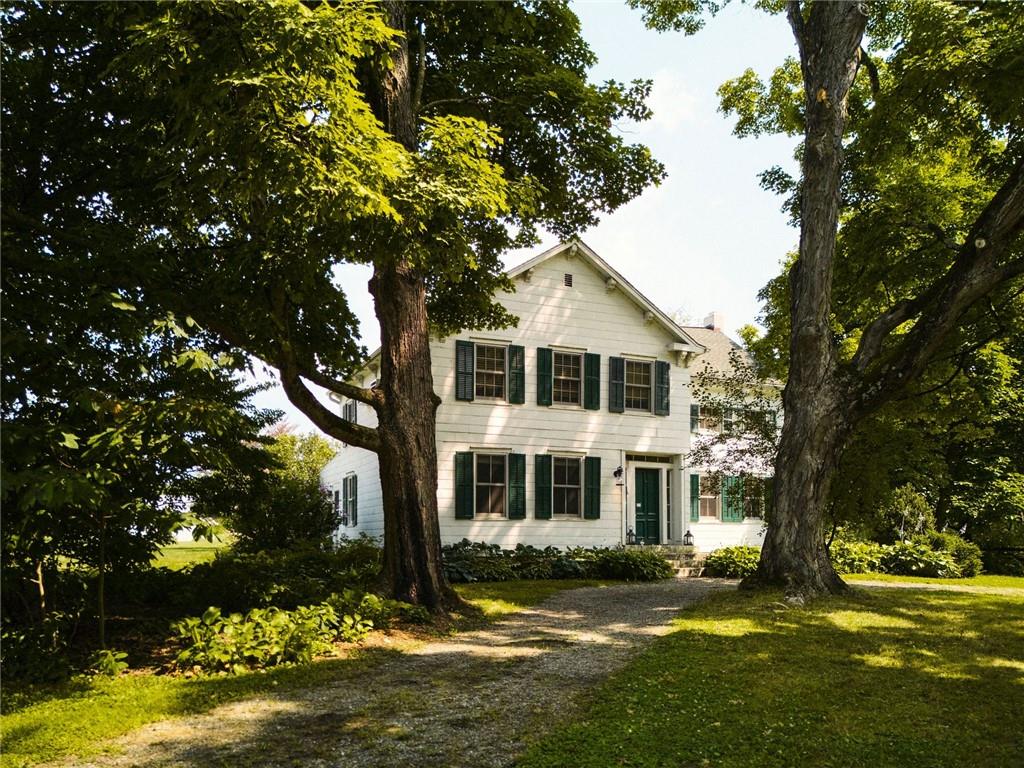 View of front of house with a front lawn