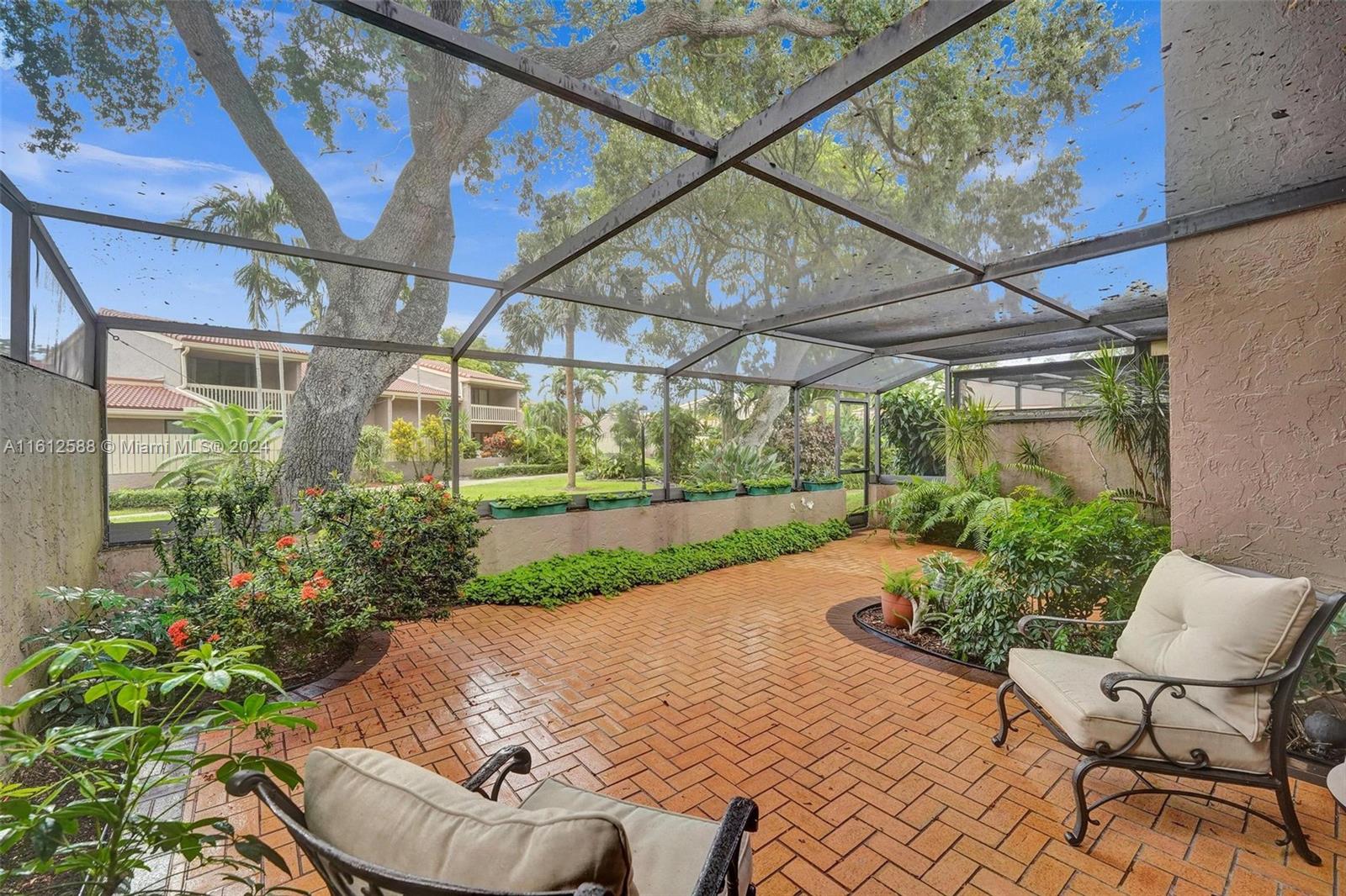 a view of a patio with chair and table in the patio