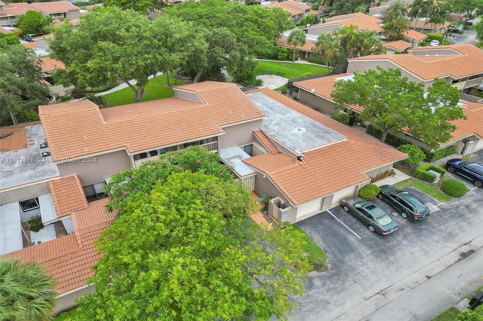 an aerial view of a house with a garden