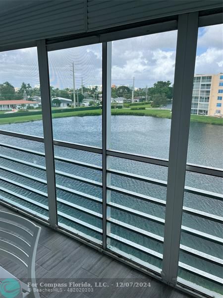 a view of a two chair in the balcony