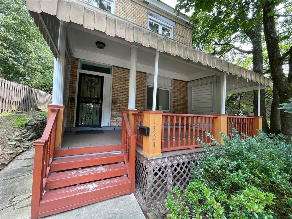 front view of a house with a porch