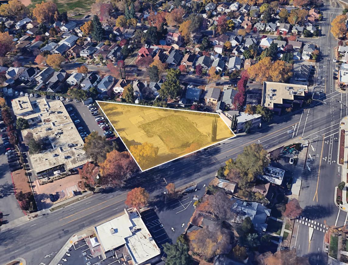 an aerial view of a house with a swimming pool