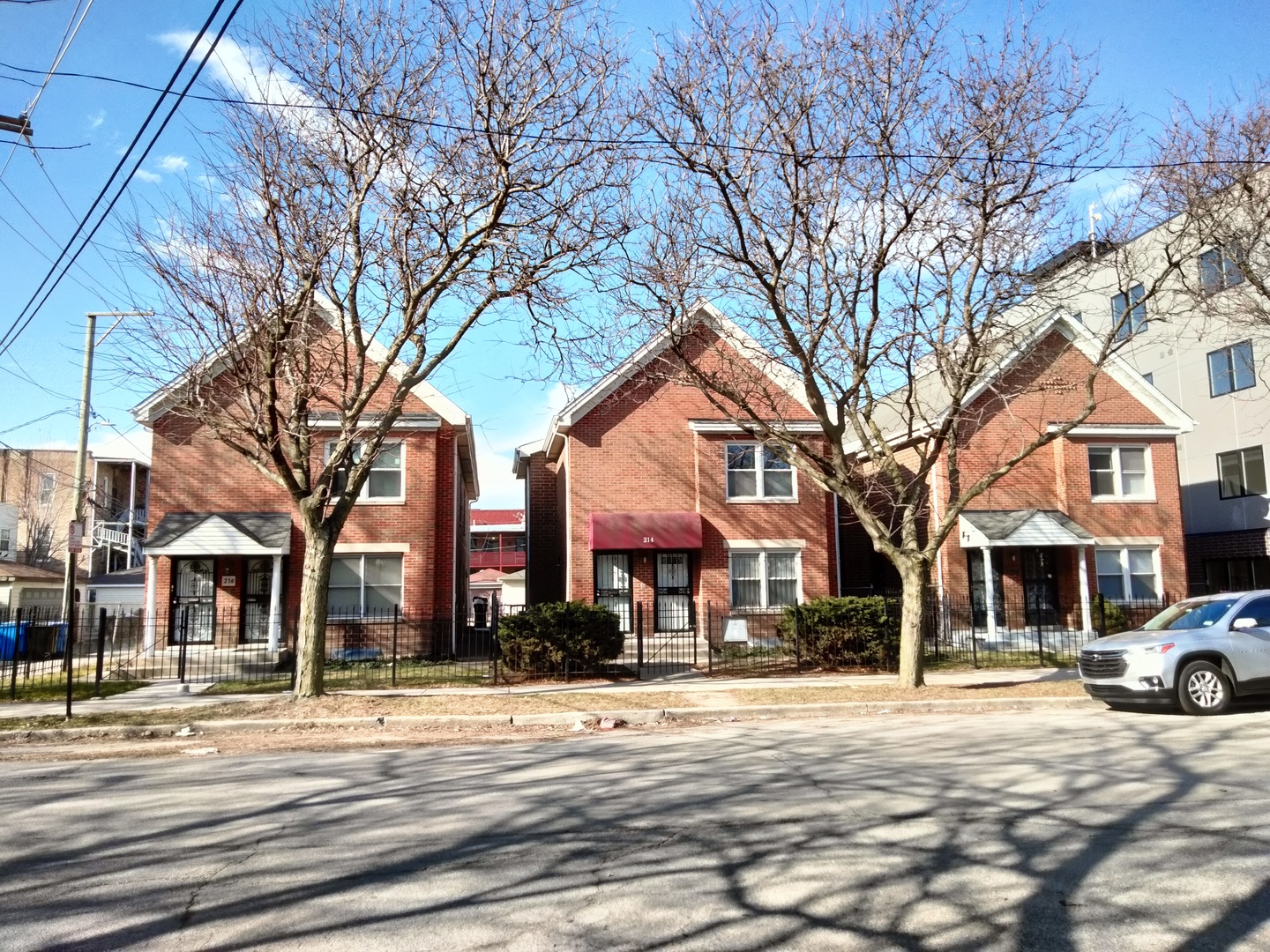 a view of a city street with a building