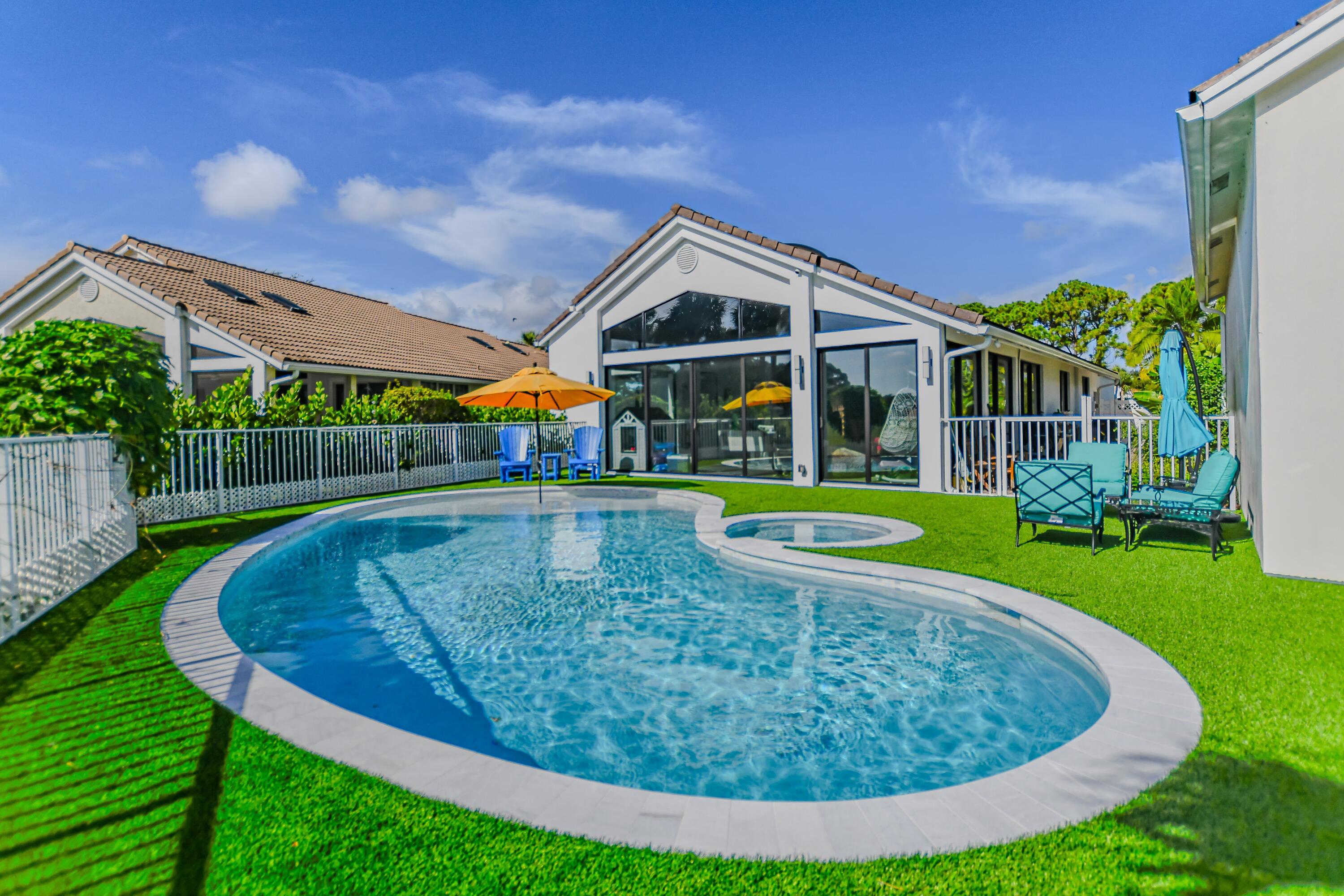 a view of a house with a swimming pool