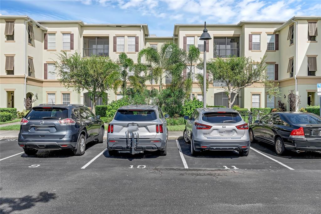 a view of a cars parked in front of a building