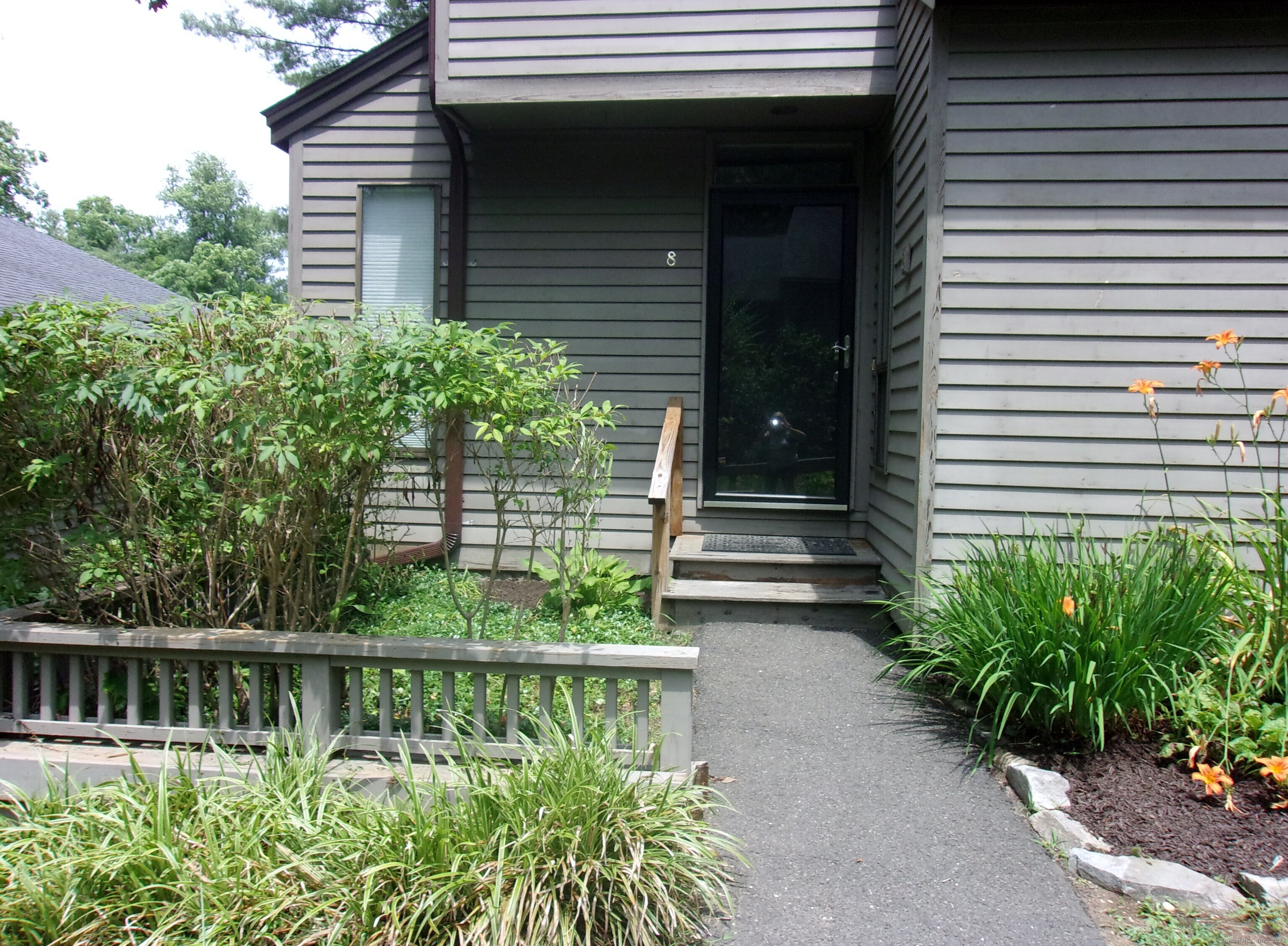 a view of house with outdoor space