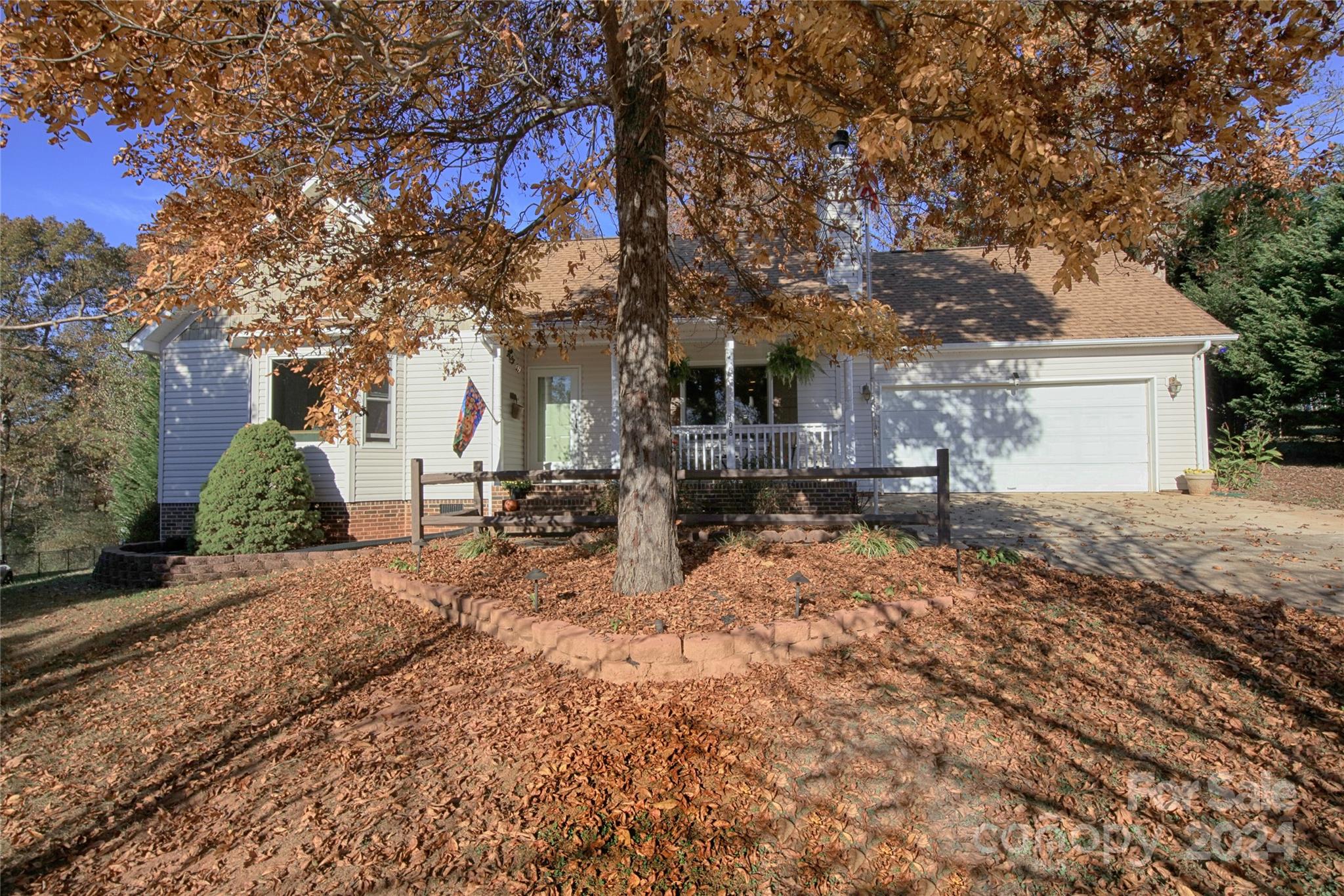 a house with trees in front of it