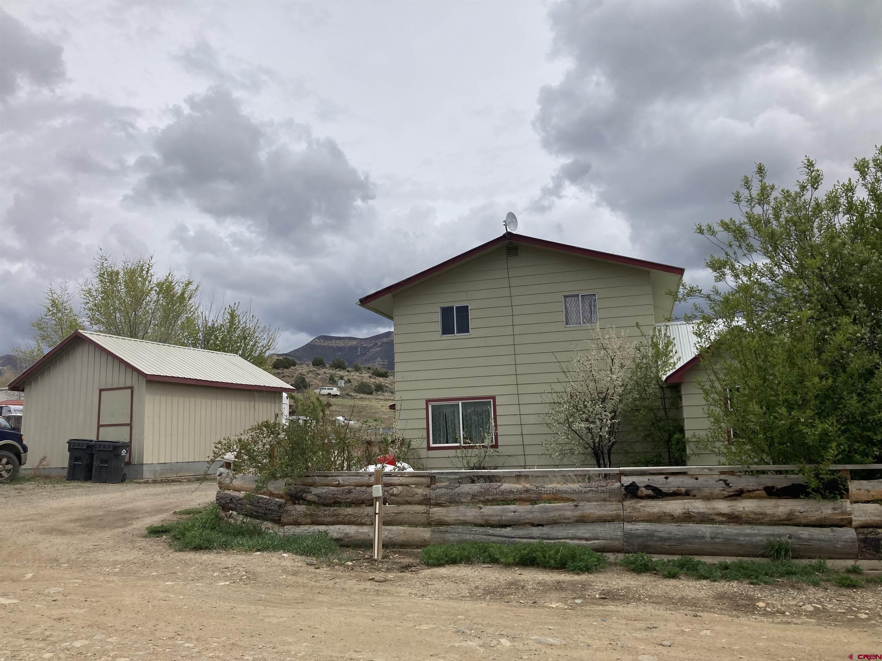 front view of house with a yard