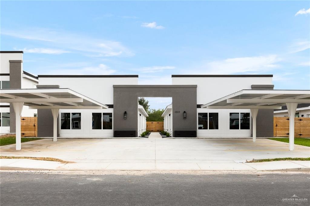 View of front of home with a carport