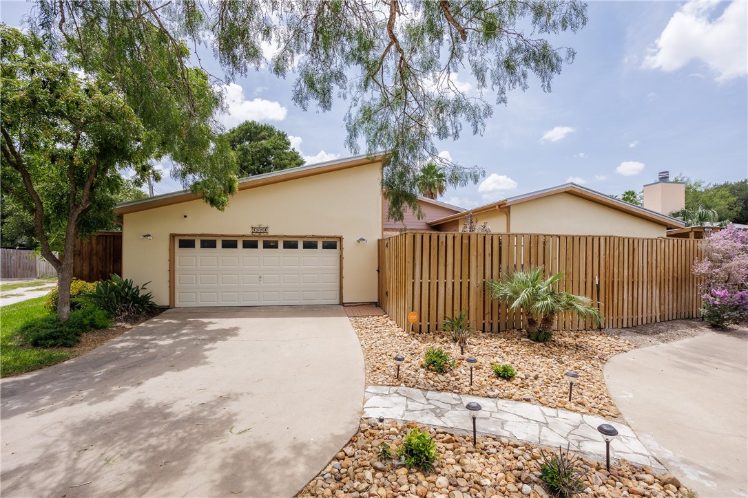 a front view of a house having yard