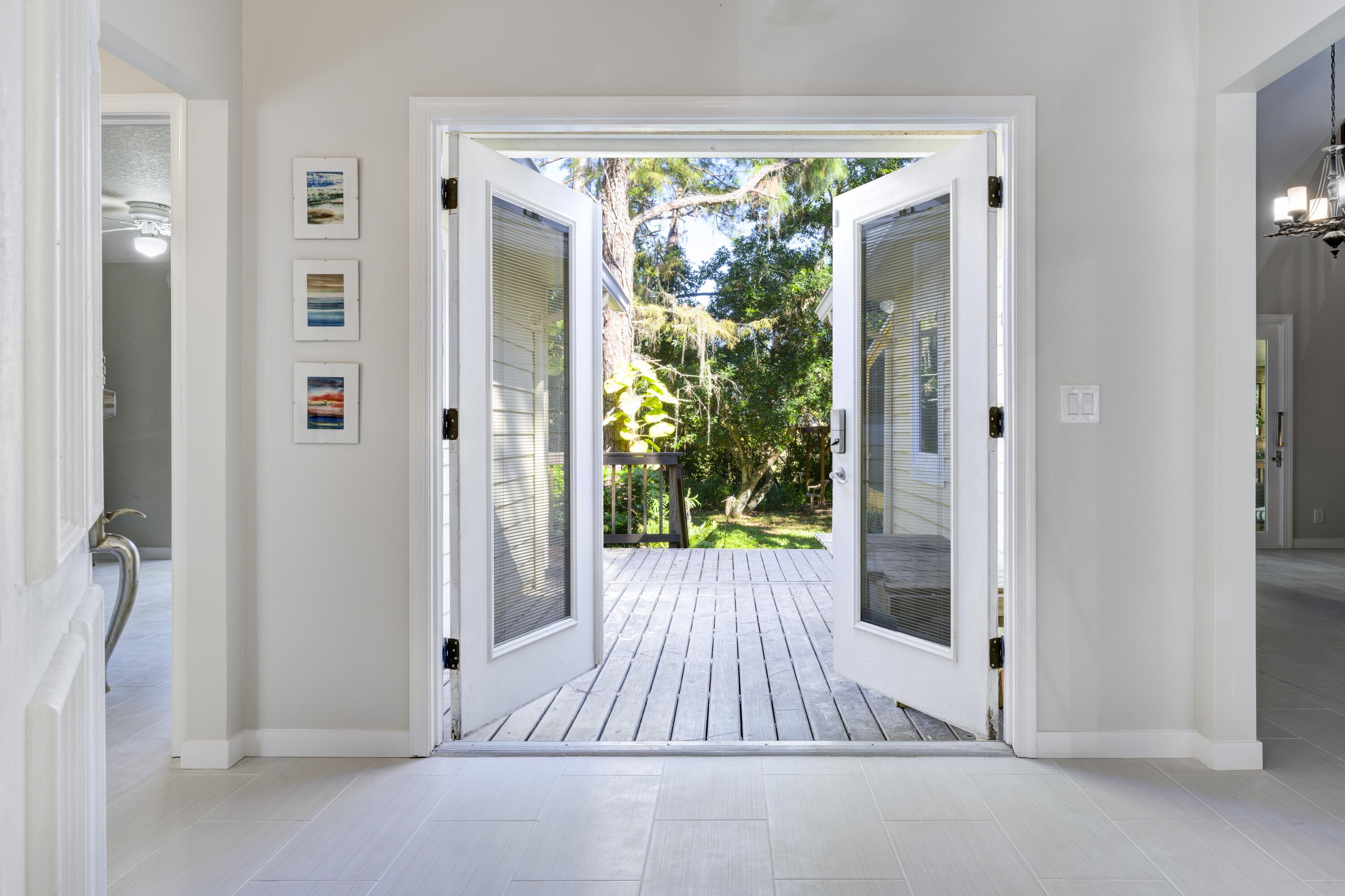 a view of entryway with window and front door