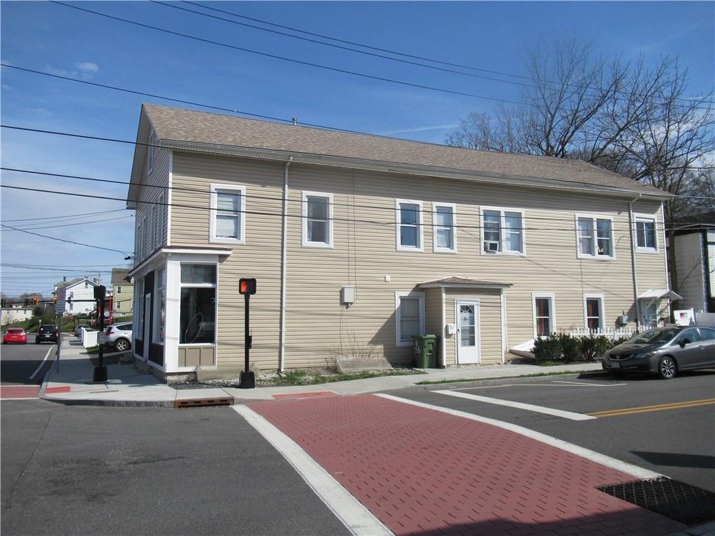 a view of a house with a street