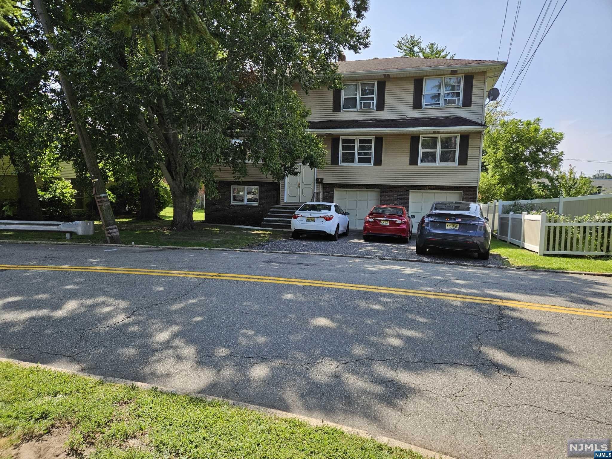 a car parked in front of a house