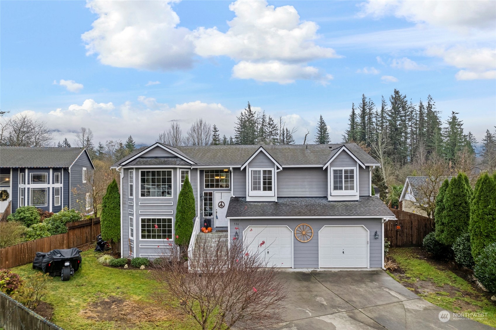 front view of a house with a yard