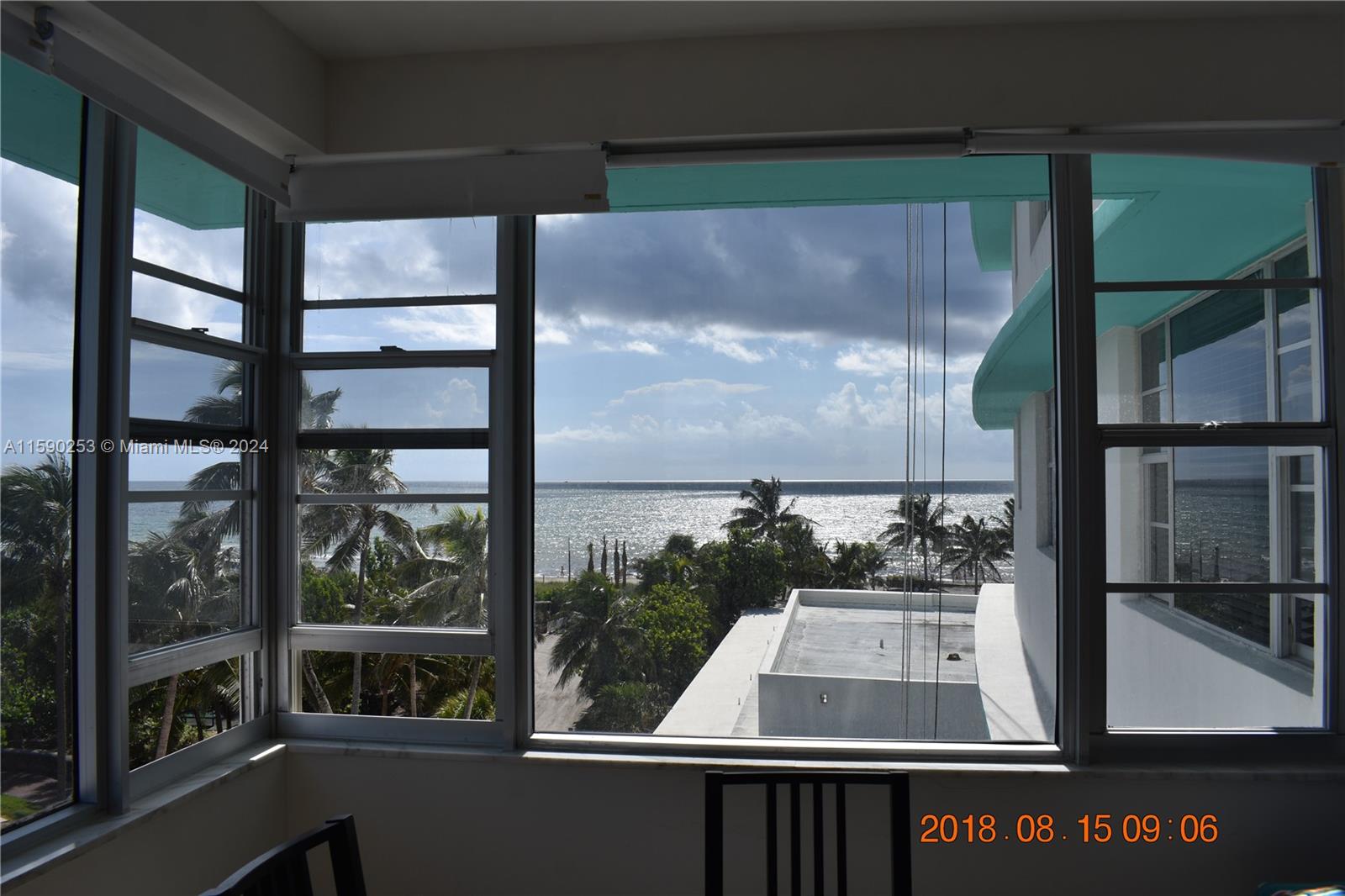 a view of balcony with a flat screen tv