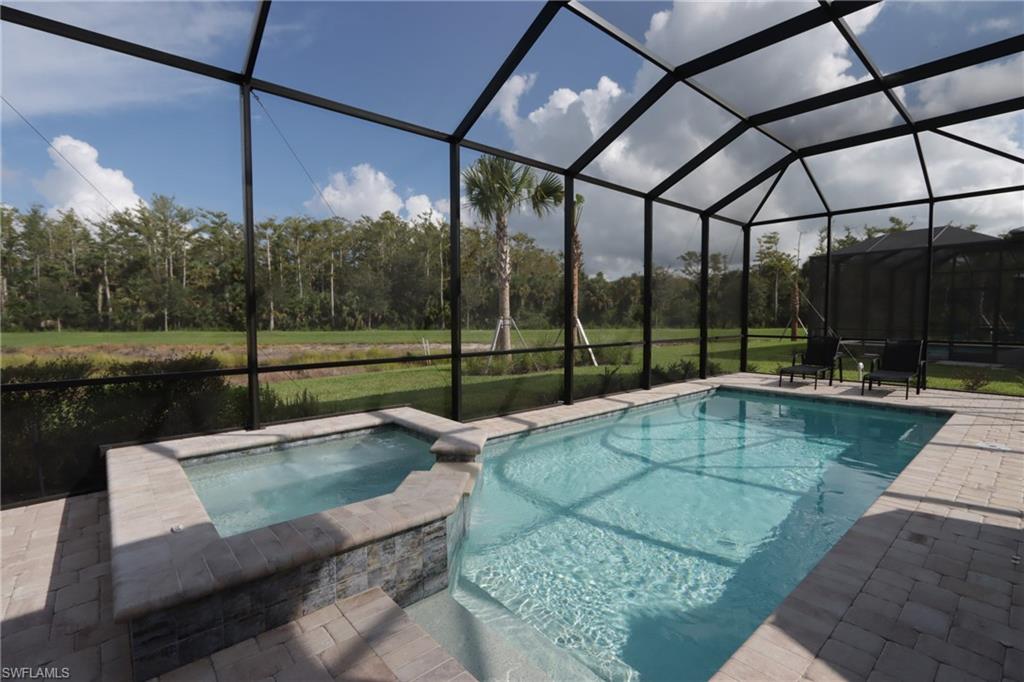 a garden view with a swimming pool