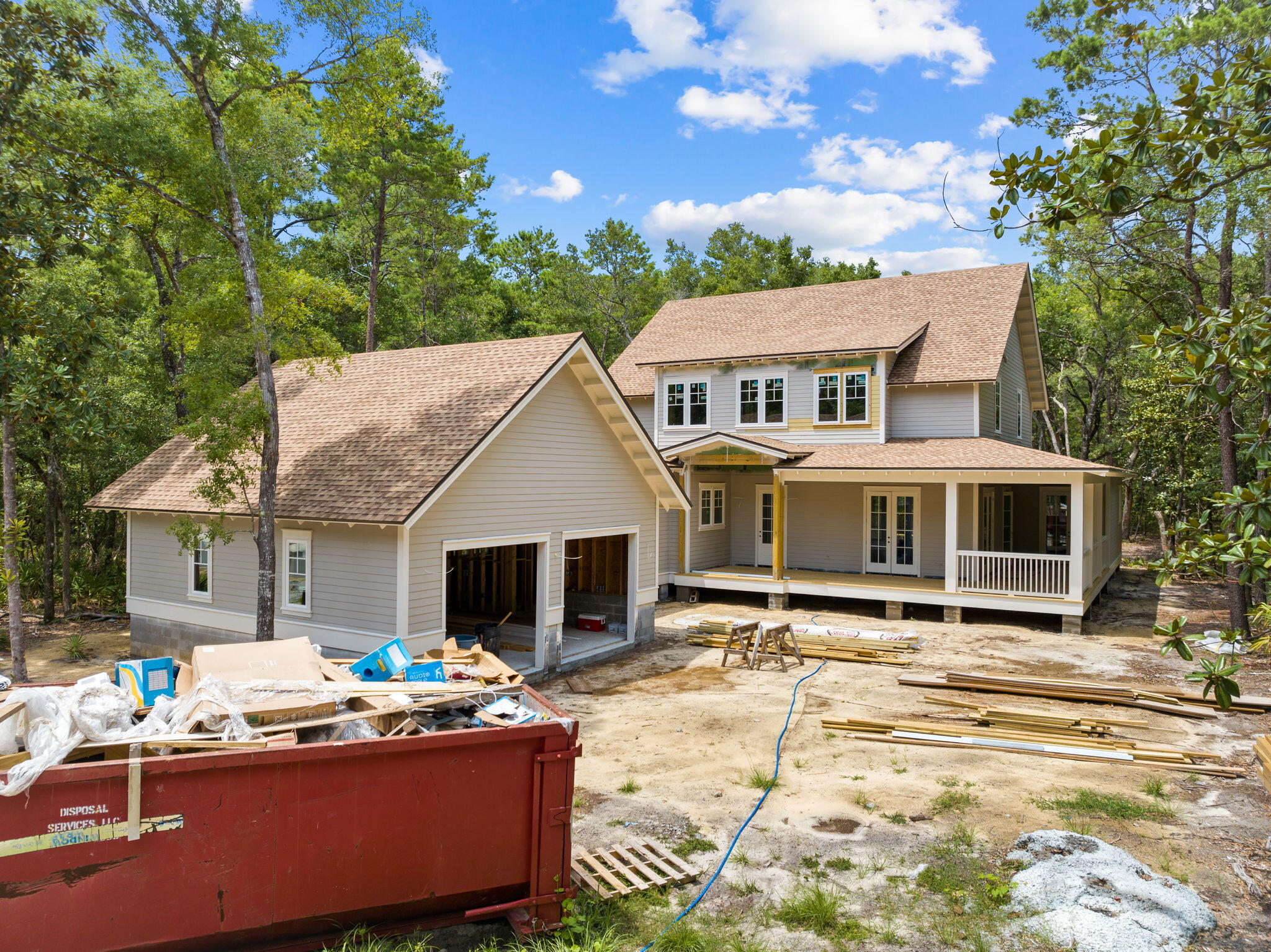 a front view of house with yard outdoor seating and barbeque oven