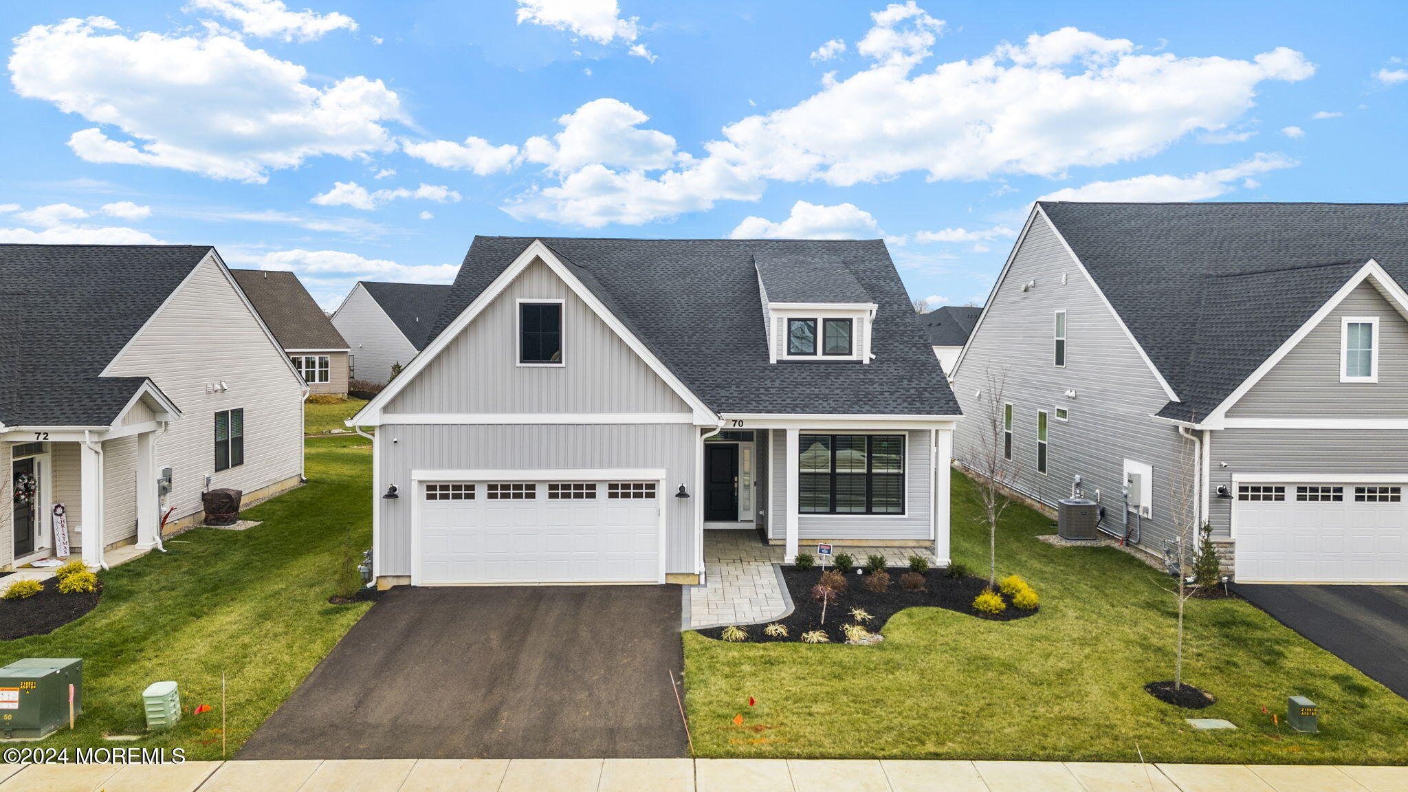 front view of a house with a yard