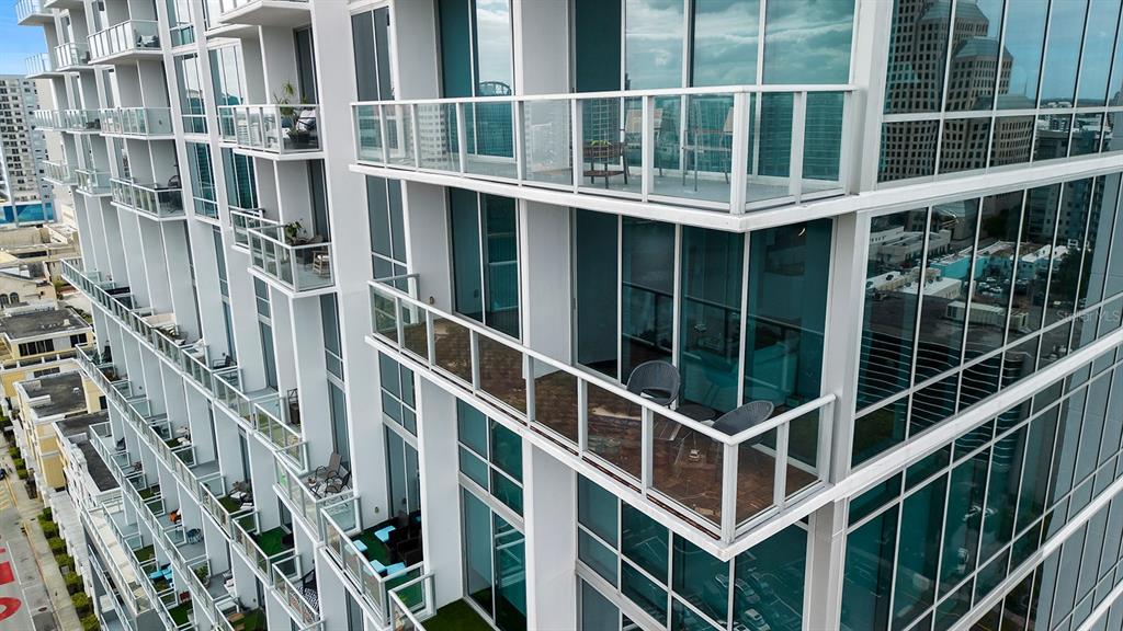 a view of balcony with a large window