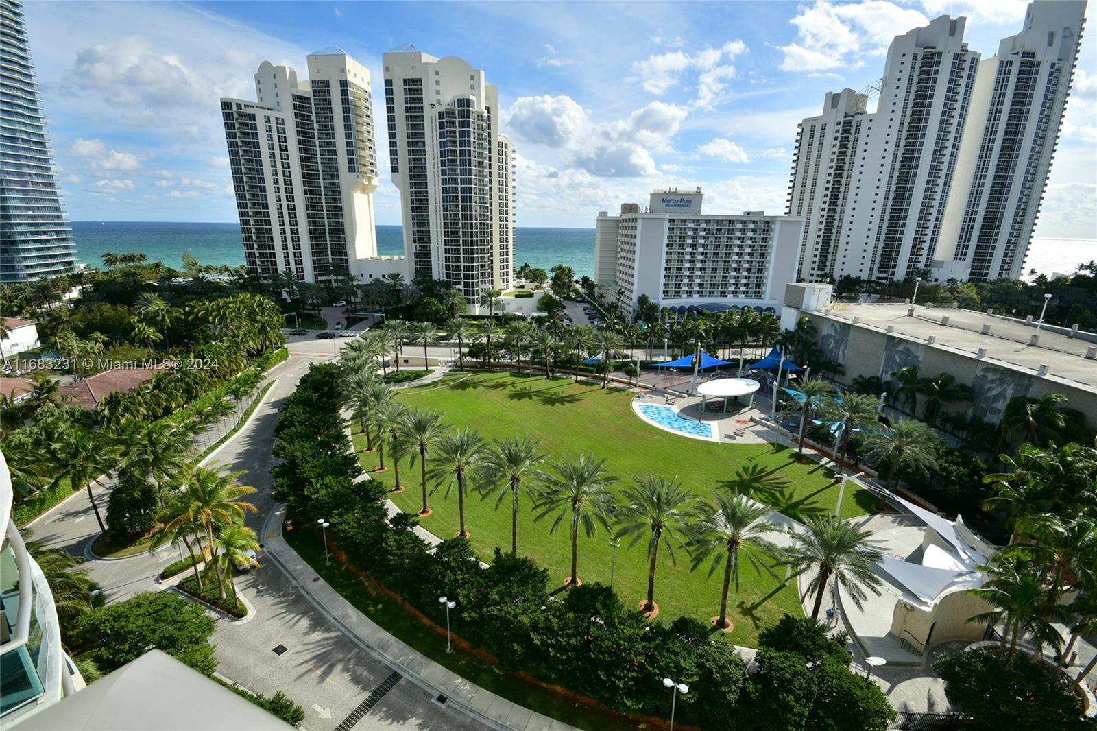 a view of a city with tall buildings