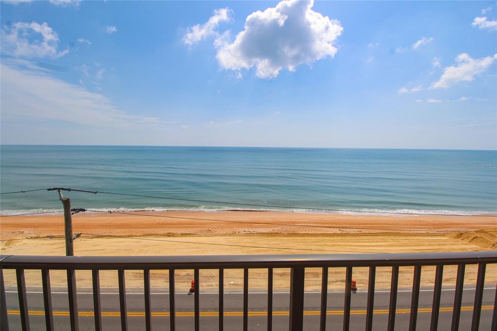 a view of ocean from a balcony